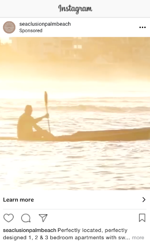 instagram post showing image of man paddleboarding on the ocean at sunrise